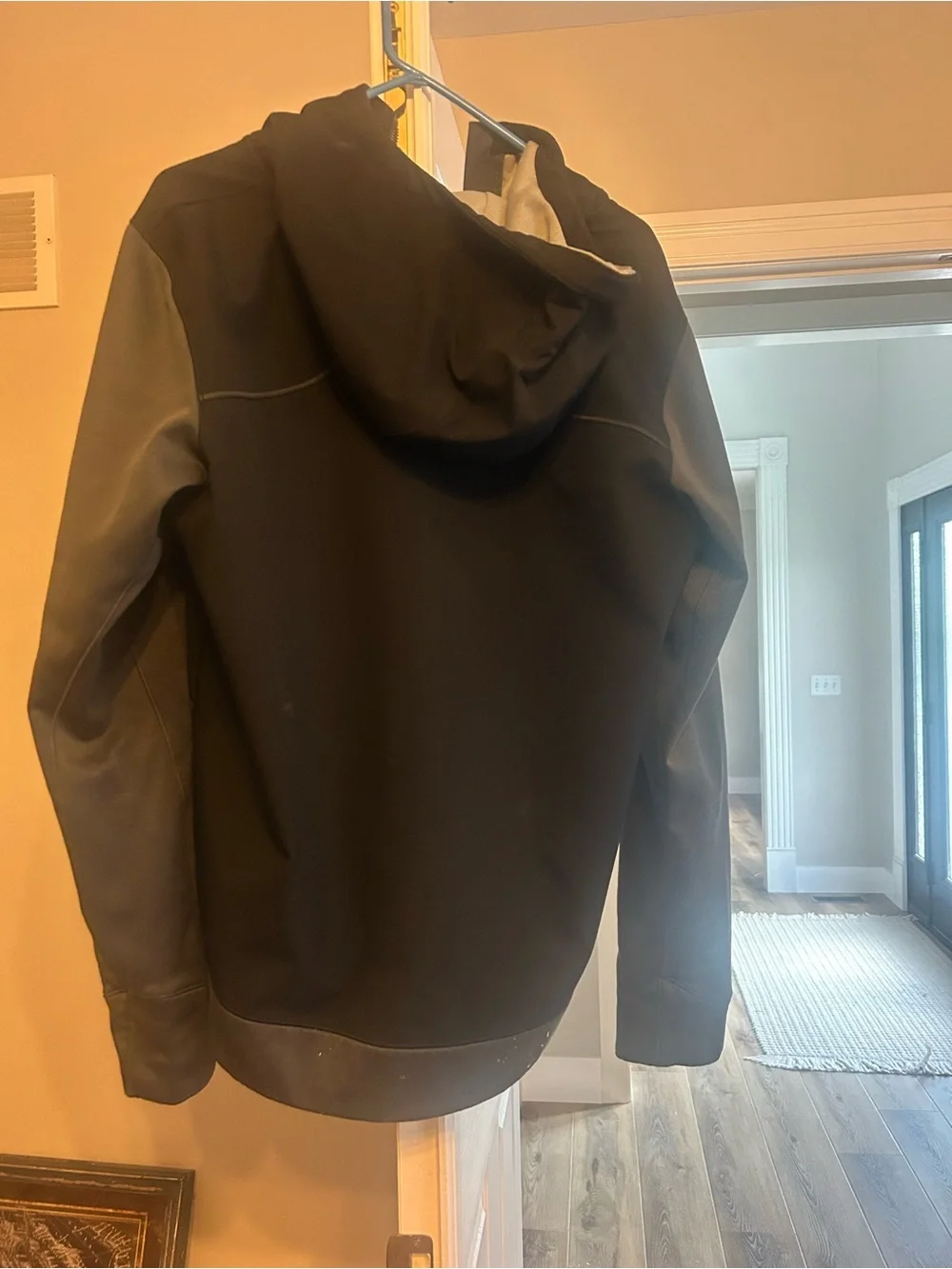 The North Face Men's Kilowatt Jacket, a hooded performance jacket